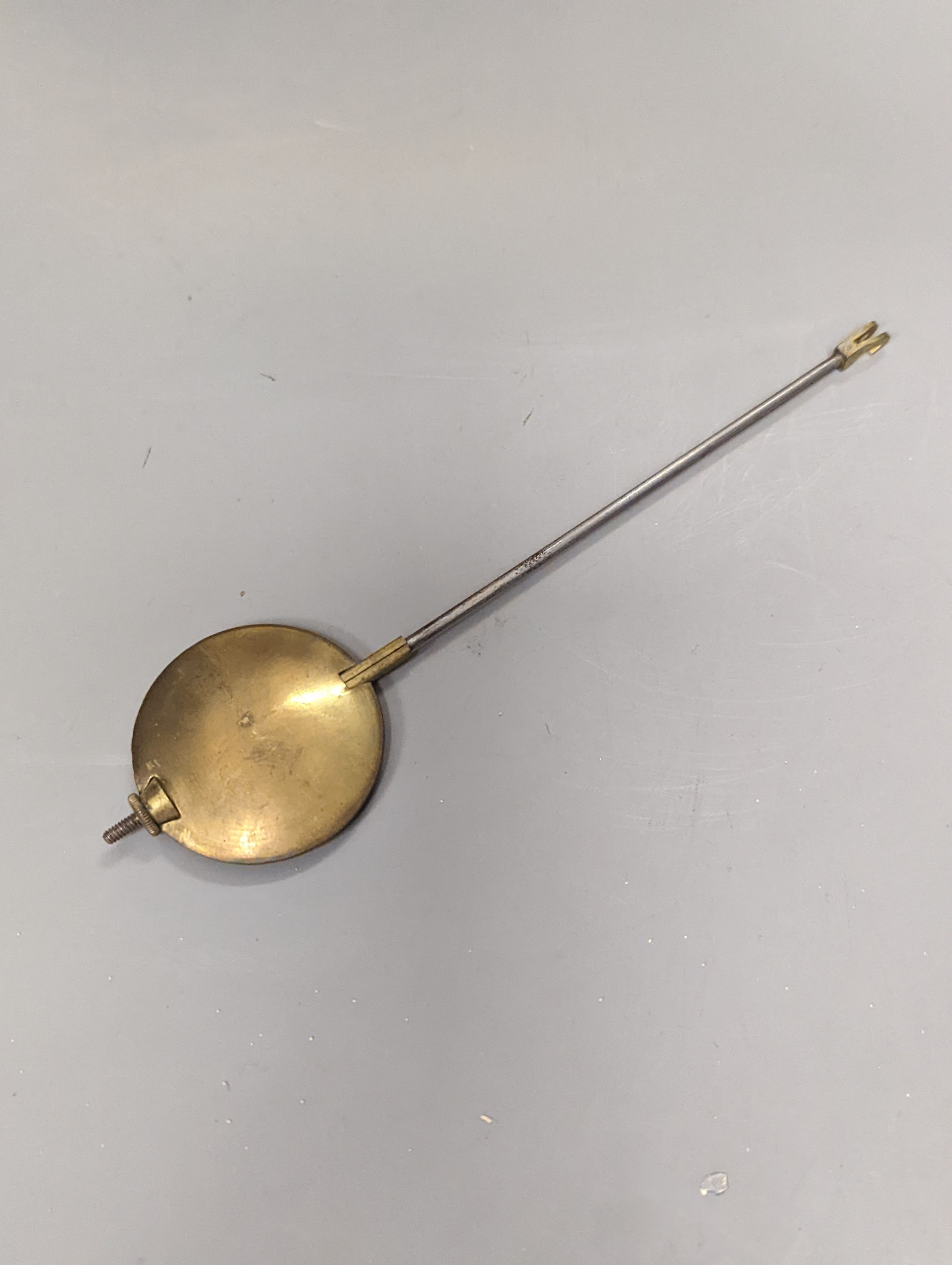 A 19th century French gilt spelter mantel timepiece, with pendulum, height 29cm